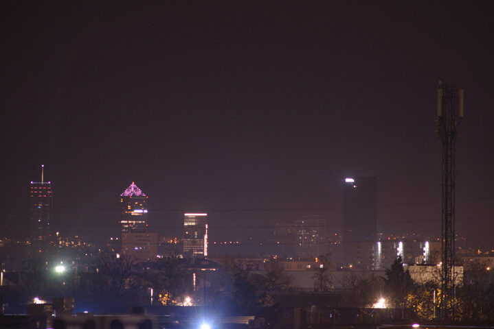 skyscrapers in the distance at night.