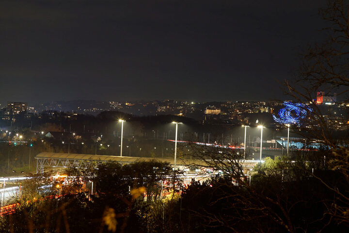 the drones over a highway in the distance